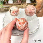 Sunstone Polished Spheres - By Weight